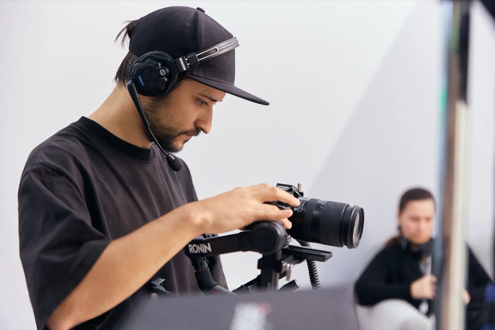 Camera operator with a gimbal, the studio’s second camera
