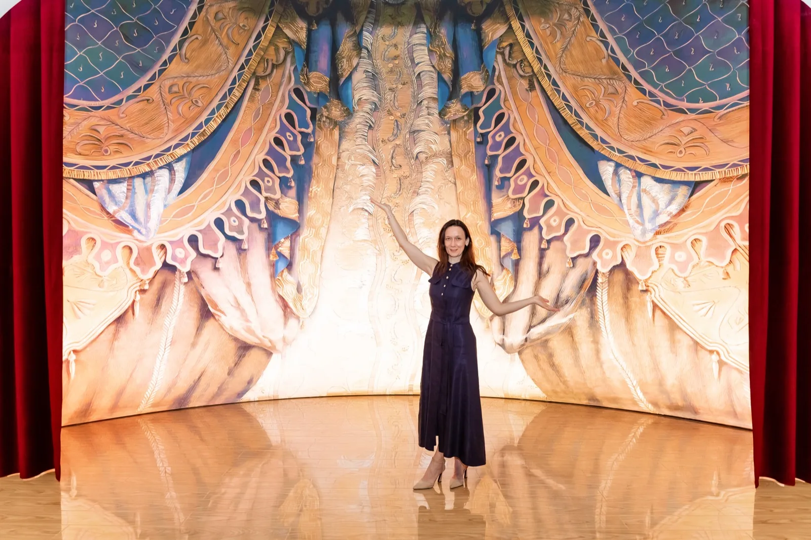 Projection mapping on a theater curtain that spans the entire wall
